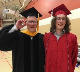 State Representative Dave Paul (D-Oak Harbor) and student