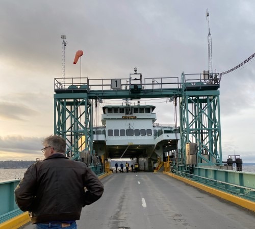 State Representative Dave Paul (D-Oak Harbor) walks on the ferry Kitsap